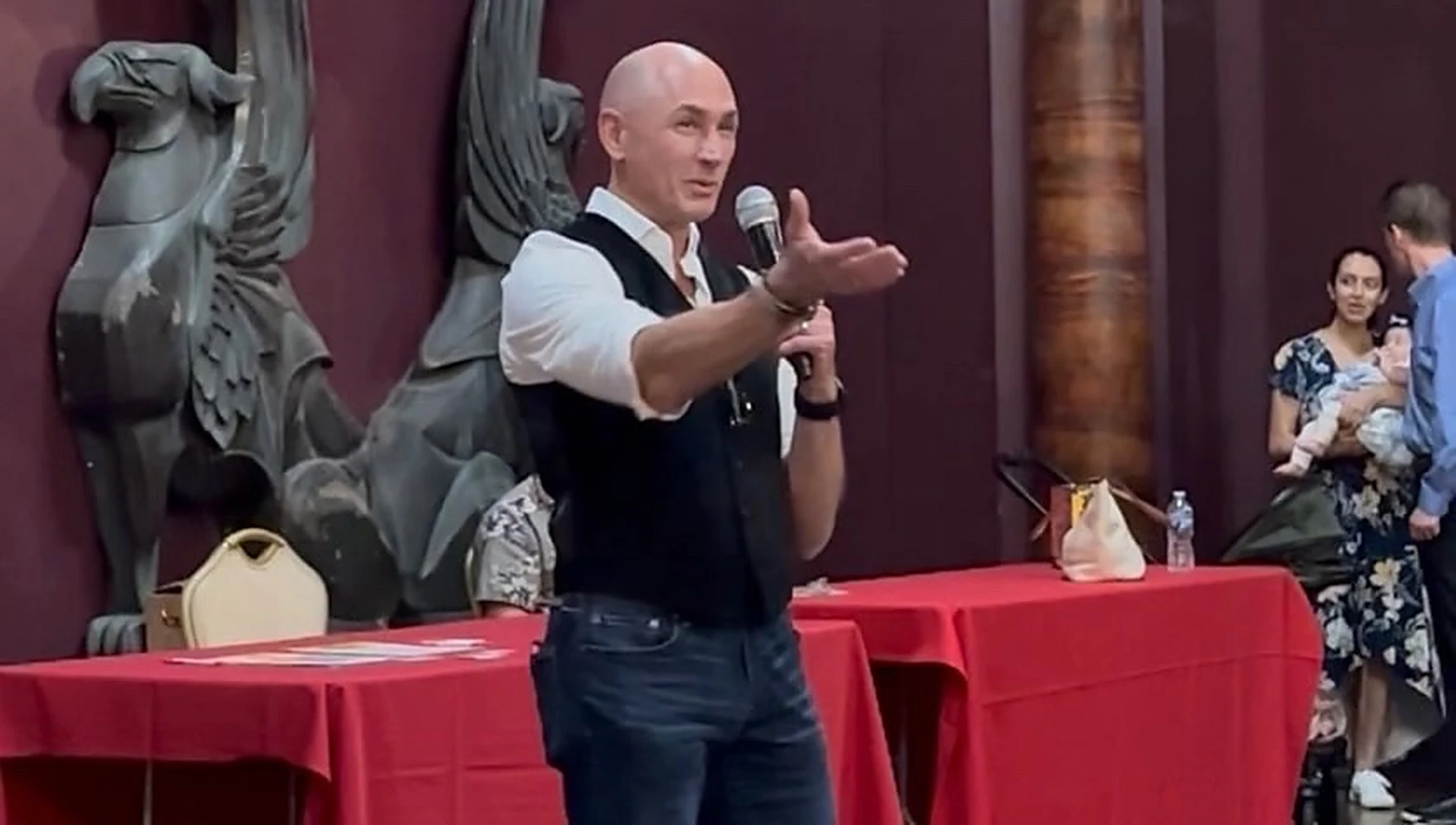 Glenn Hemanes speaking at a community event.