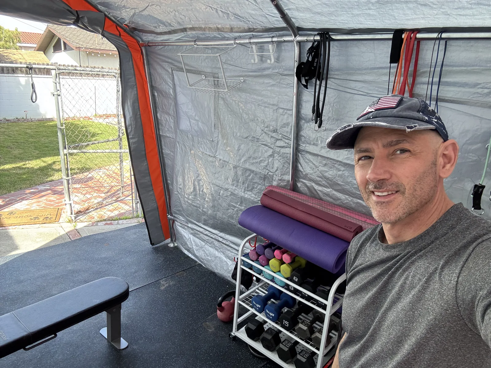 Glenn Hemanes in a home gym organized around how the space is actually used.