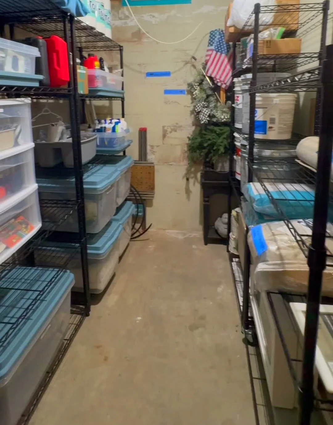 Same garage storage area after the DeclutterMeNow organizing project.